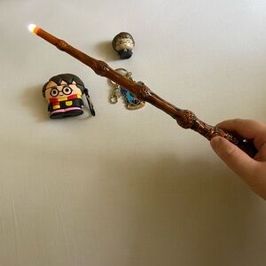 Harry Potter bundle - airpod case, wand, Raven Claw keychain, and squishy Harry
